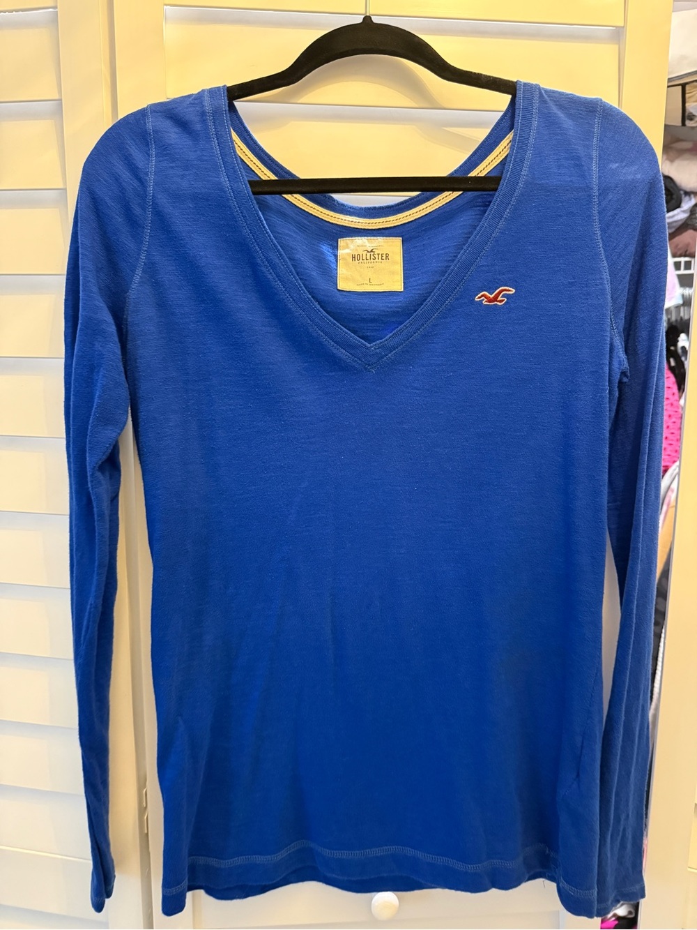Hollister Women's V-Neck Long Sleeve Top in Royal Blue with Red Logo